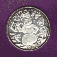 tarnished holiday silver round