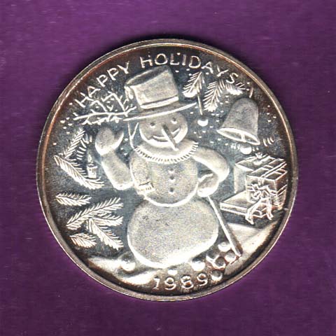 tarnished holiday silver round